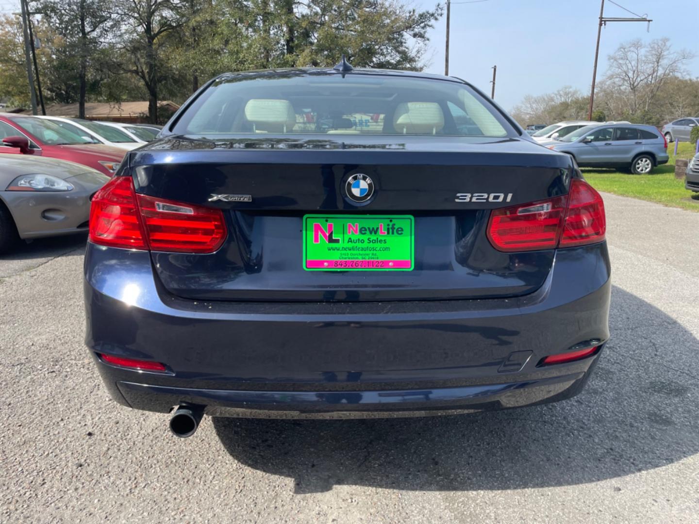 2014 BLUE BMW 3 SERIES 320I XDRIVE (WBA3C3G54EN) with an 2.0L engine, Automatic transmission, located at 5103 Dorchester Rd., Charleston, SC, 29418-5607, (843) 767-1122, 36.245171, -115.228050 - Local Trade-in with Leather, Sunroof, Navigation, CD/AUX/USB, Hands-free Phone, Dual Climate Control, Power Everything (windows, locks, seats, mirrors), Heated, Seats, Push Button Start, Keyless Entry, Alloy Wheels. Clean CarFax (no accidents reported) 101k miles Located at New Life Auto Sales! 202 - Photo#5